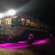 Image for article titled This Wild School Bus RV Has Underglow And A Fire Pit On Its Roof